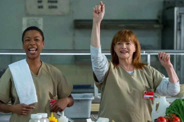 Judy King (Blair Brown) seems to be cheerful with her fan Poussey (Samira Wiley) by her side. 