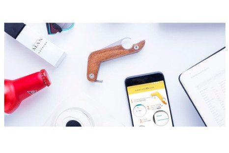 The world's first smart bottle opener texts your friends when you crack open a bottle of booze. 