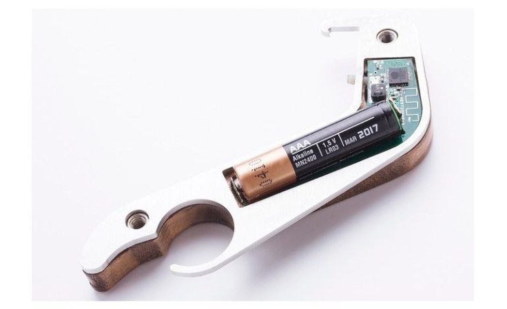 The world's first smart bottle opener texts your friends when you crack open a bottle of booze.