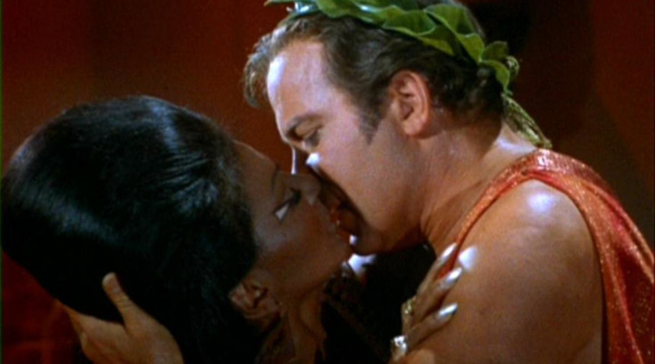 Uhura and Kirk kiss in 'Star Trek' episode "Plato's Stepchildren."