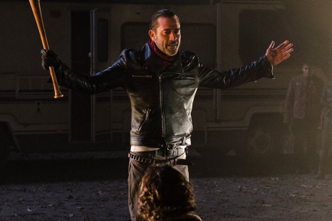 Negan swings Lucille in front of Rick's group.