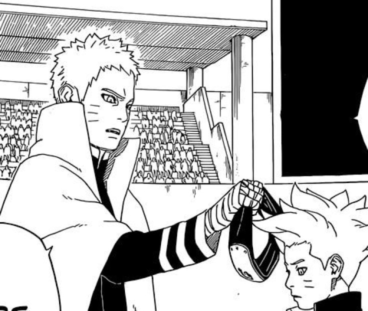 Naruto takes Boruto's headband away.
