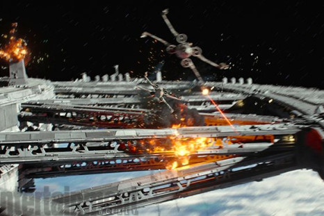 X-Wing fighters breach a space-station gateway to enter the planet's atmosphere.