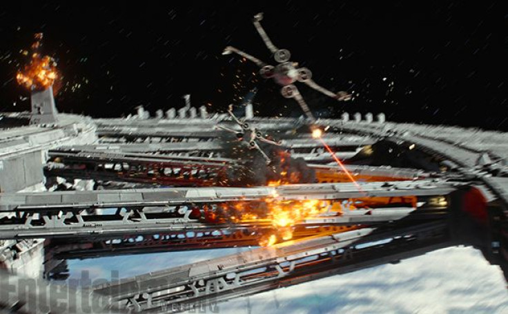 X-Wing fighters breach a space-station gateway to enter the planet's atmosphere.