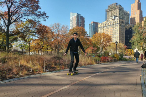 Editor Danny Choy rides the Acton Blink S electric skateboard.