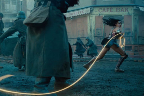 Wonder Woman uses her famous Lasso. 