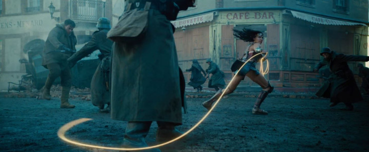 Wonder Woman uses her famous Lasso. 