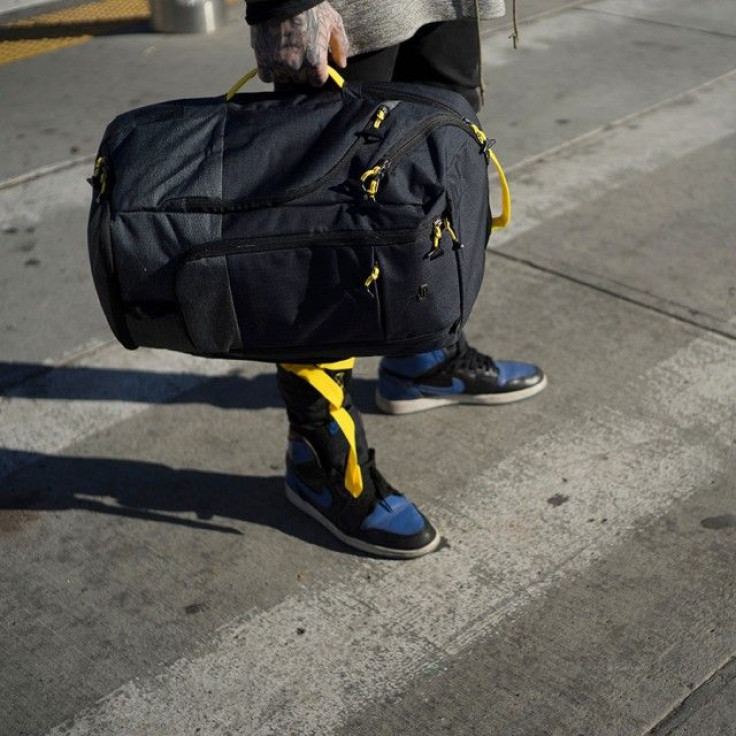The backpack can convert into a tote bag with ease.