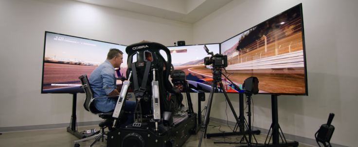 American Porsche factory driver Patrick Long behind the wheel of 'Project Cars 2.'
