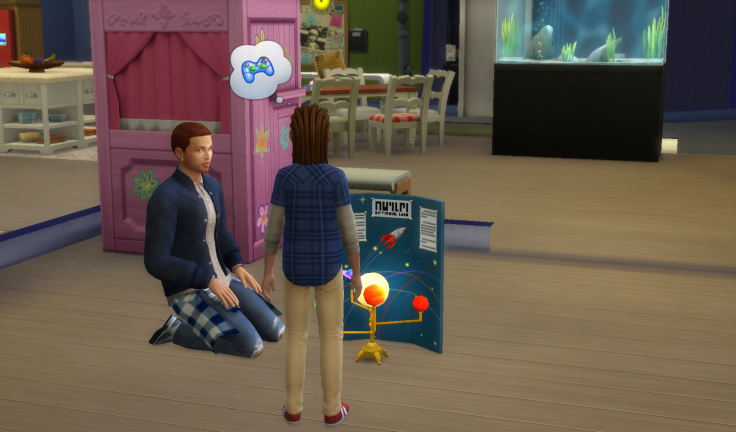 A father helps his daughter with a school project.