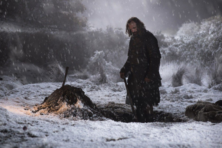 The Hound buries the dead in 'Dragonstone.'
