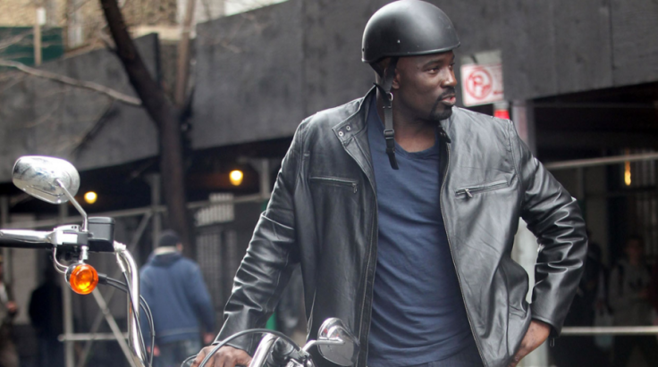 In 'Jessica Jones,' Luke Cage rocks a leather moto jacket with a blue t-shirt.