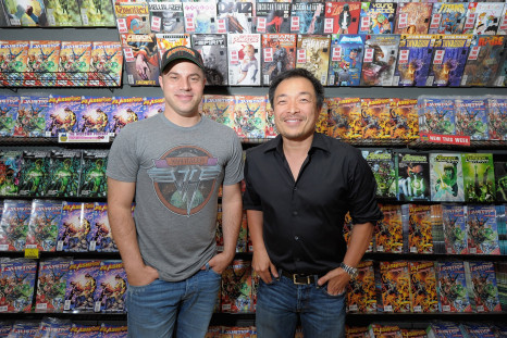 Jim Lee, artist and co-publisher of DC Comics and Geoff Johns, DC Comics co-publisher at Midnight Madness event celebrating the release of New No. 1 issue of 'Justice League' at Mid Town Comics on August 30, 2011 in New York City.