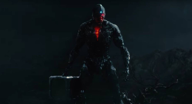 What is Cyborg carrying? Probably a Mother Box. 