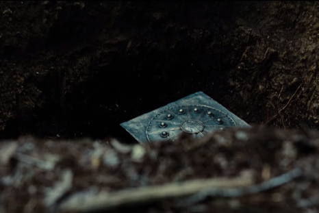 A Mother Box buried by who look to be New Gods in the Justice League trailer. 