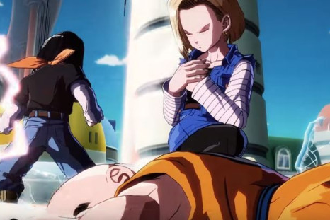Android 18 kneeling over Krillin. 