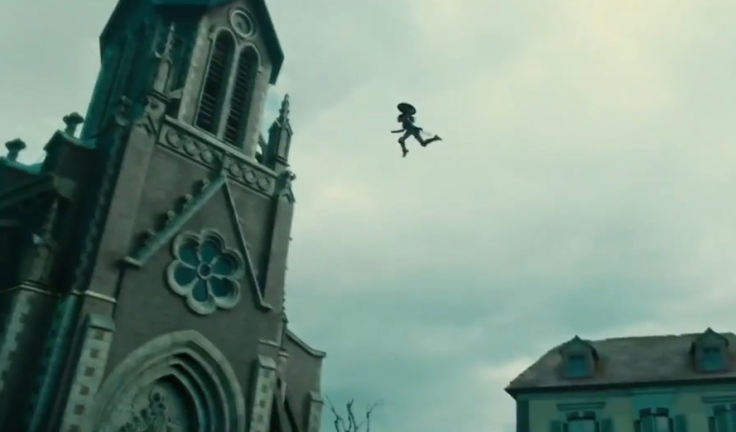 Wonder Woman jumps into the air and takes down a sniper.