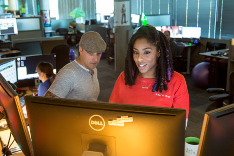 Jessica Williams, wearing The Sims plumbob, visited EA headquarters in October. 