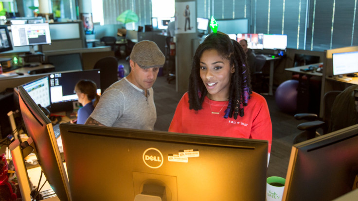 Jessica Williams, wearing The Sims plumbob, visited EA headquarters in October. 