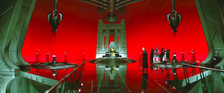 Admiral Hux stands before Snoke in the Supreme Leader's throne room.