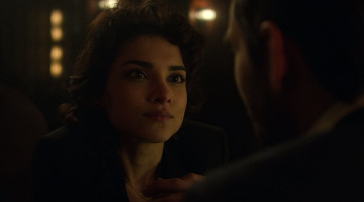 Amber Rose Revah as Dinah Madani. 