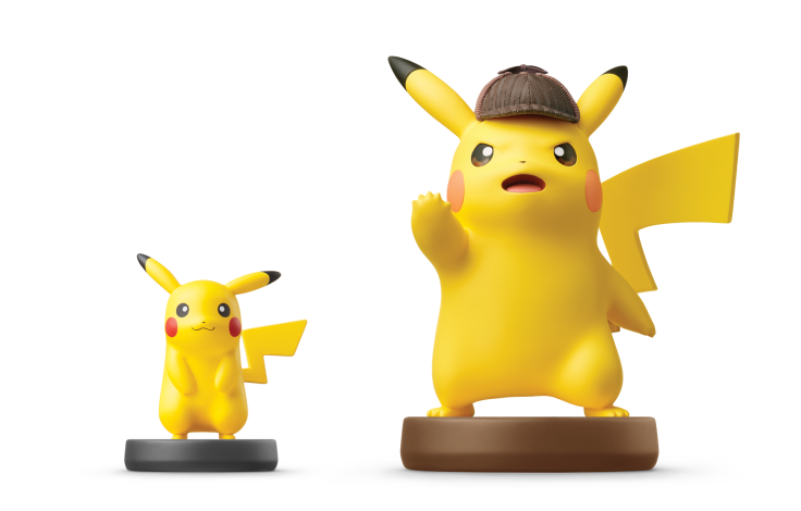 The large Detective Pikachu amiibo, compared to the normal-sized Pikachu amiibo