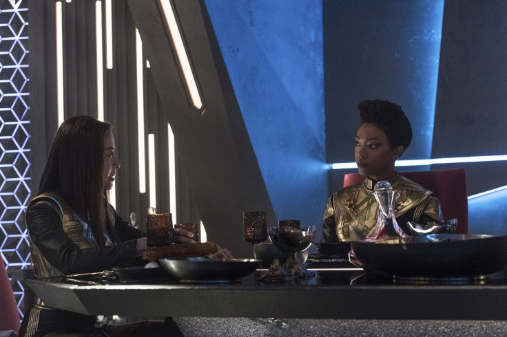 Emperor Georgiou and Michael Burnham feast on threat ganglia.