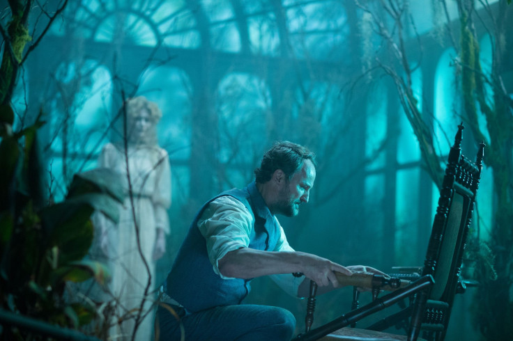 Dr. Eric Price (Jason Clarke) and a spoOOOoooky ghost.