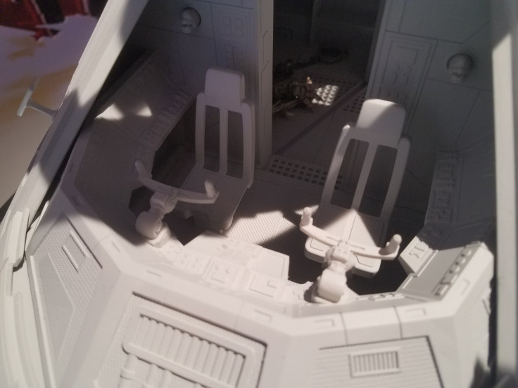 The cockpit area was never seen in the Star Wars movies, so Hasbro had to figure out what it looks like
