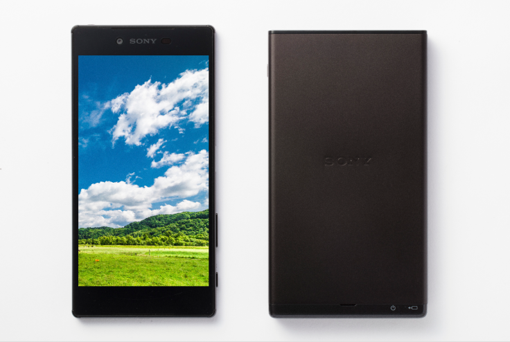 The MP-CD1 compared to a Sony smart phone. The projector is about the same size, but is thicker than your average cell phone