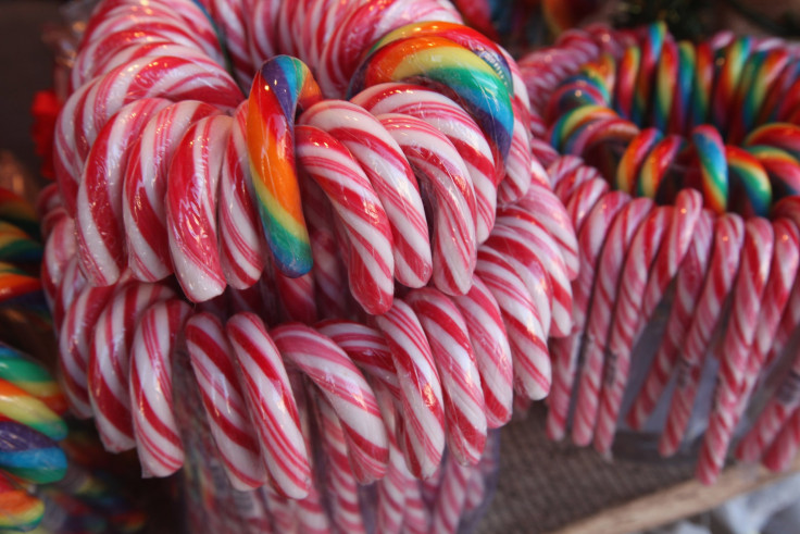 Christmas candy and candy canes stand on display for sale at the Christmas market at Gendarmenmarkt square on the market's opening day on November 21, 2011 in Berlin, Germany.