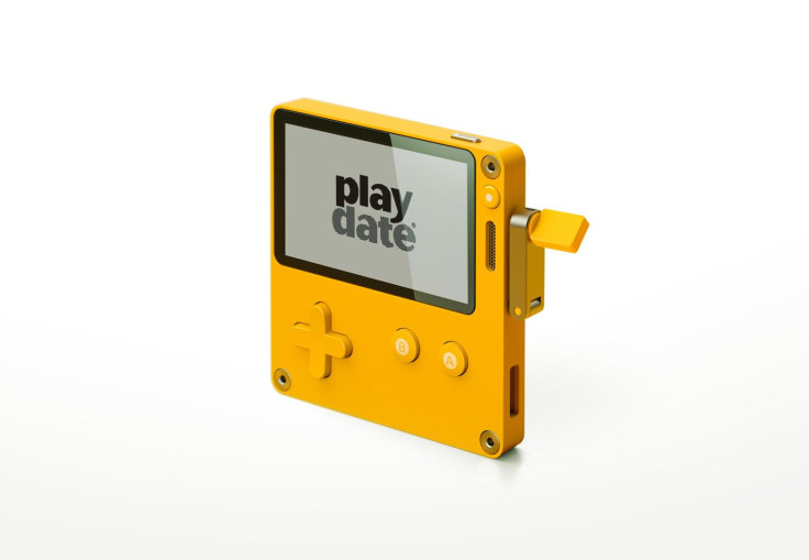 The Playdate looks kind of like a squished Game Boy, but with a crank built into the side of it.