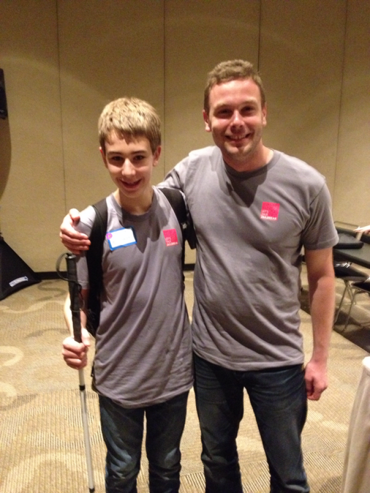 Justin Wack (@s33wack), pictured with @pod2g at JailbreakCon 2014. Justin is a 14 year old blind student who hopes to release the first jailbreak theme for the blind on Cydia. Read his incredible story here.  (Photo: Twitter)