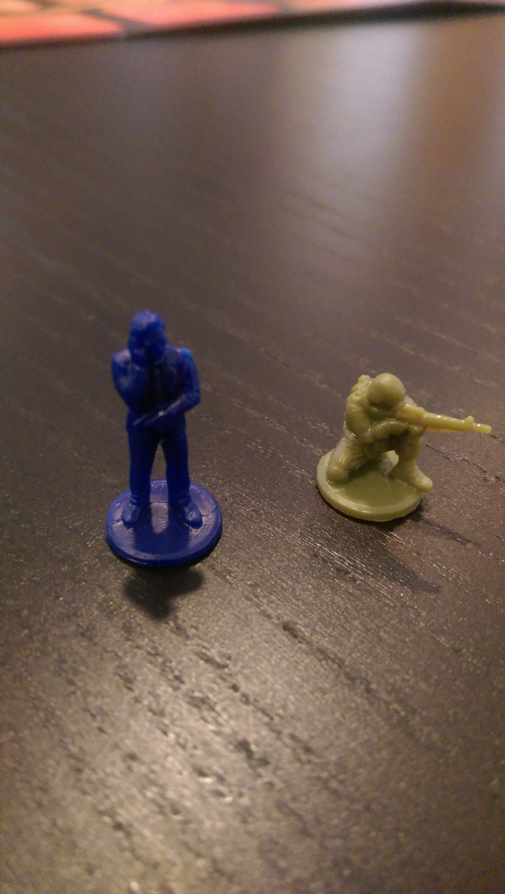 A troop mini figure and an agent mini figure